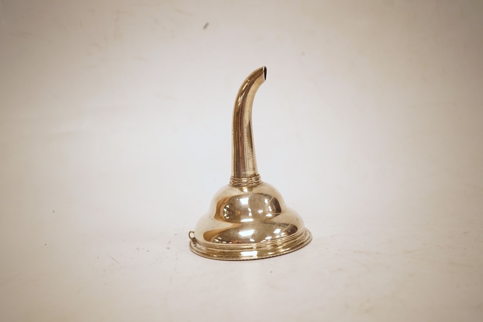 A George III small silver wine funnel (lacking strainer), maker's mark rubbed, London, 1767, 9.9cm, 52 grams.